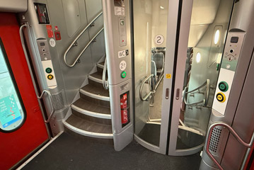 Entrance & stairs on a double-deck intercity train from Brussels to Bruges